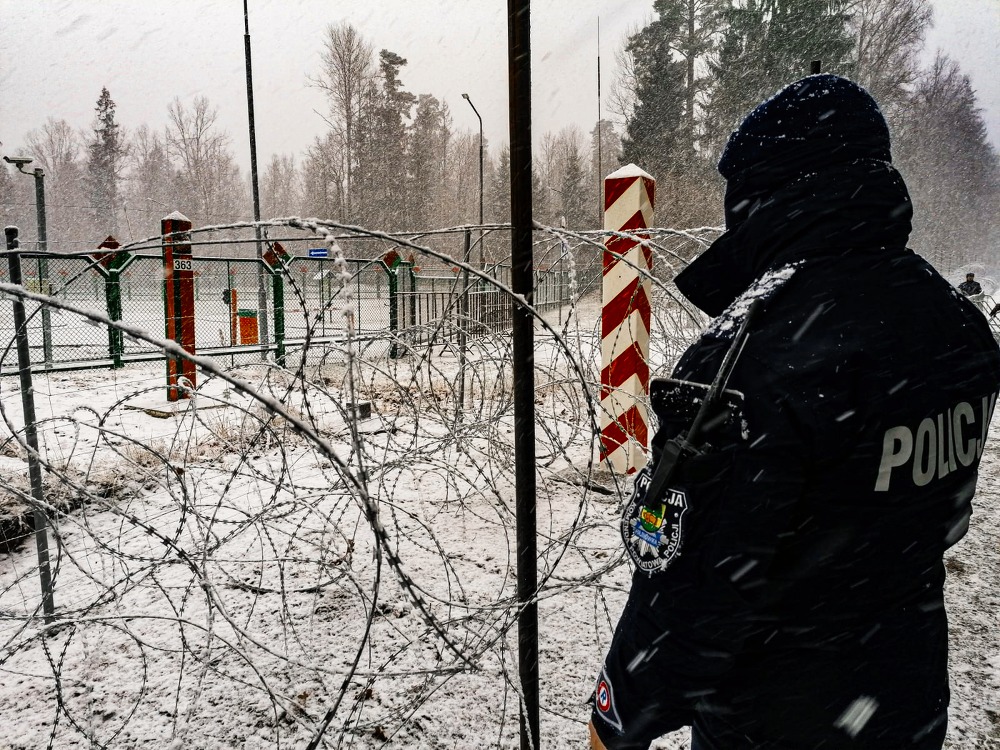 A police officer guarding Polish-Belarusian border