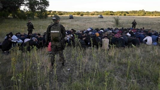 Police, migrants